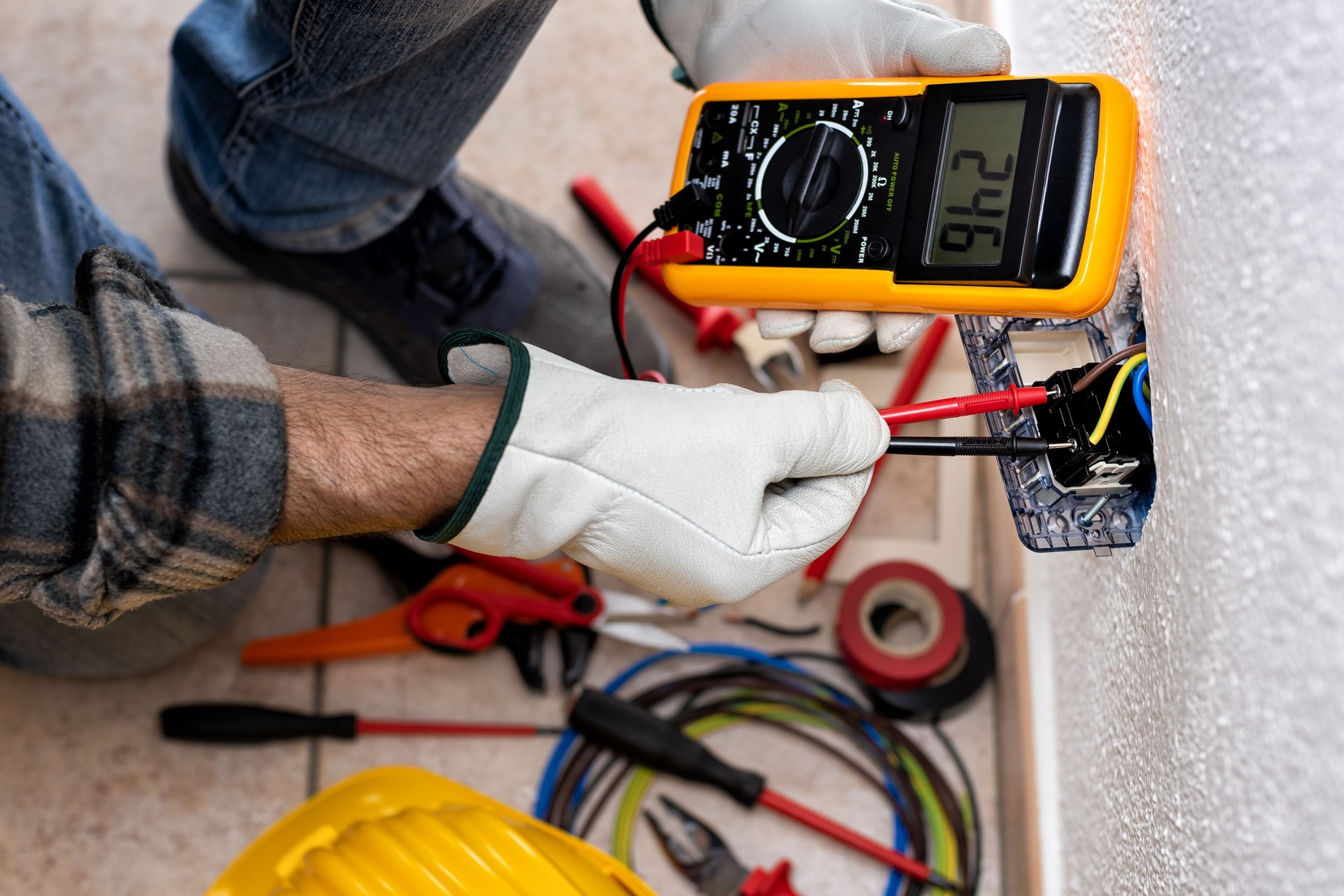 Electrician at work on a residential electrical system. Electricity.