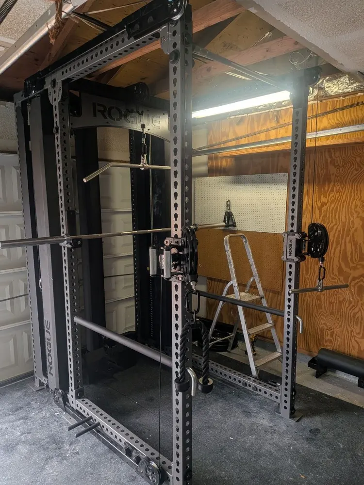 Power rack home gym assembled in a garage