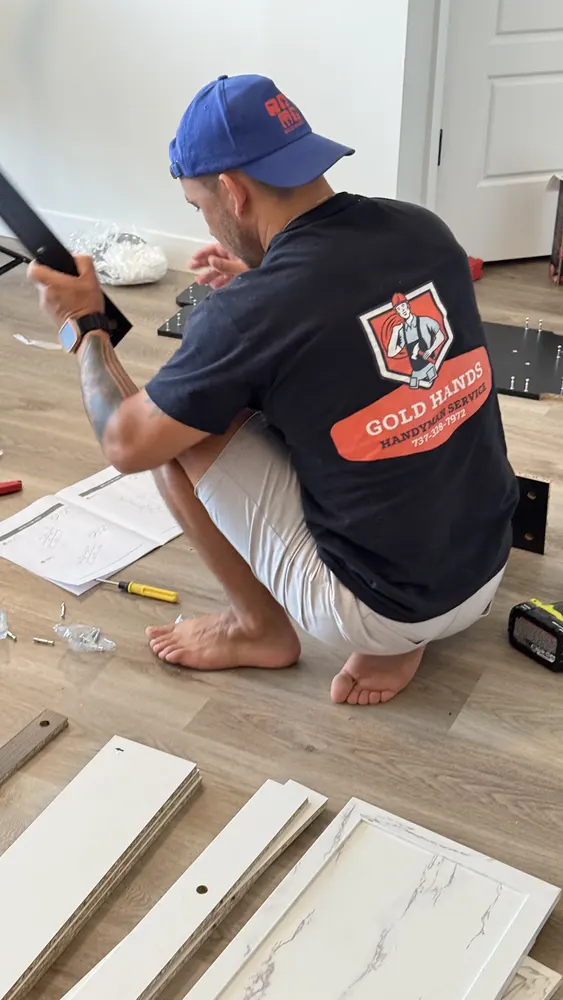 Gold Hands technician assembling furniture